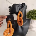 OLAEDO orange Raffia Linked loop earrings